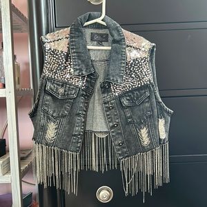 Adorable sequin jean jacket.
